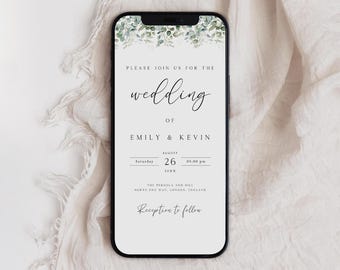 May include: A wedding invitation on a smartphone screen with a green floral border. The invitation reads "Please join us for the wedding of Emily & Kevin, Saturday, August 26, 20XX, 05:00 pm, The Pergola and Hill, North End Way, London, England. Reception to follow."