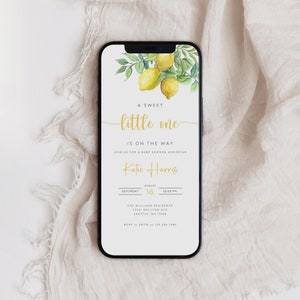 May include: A baby shower invitation with a watercolor illustration of lemons and leaves. The text reads "A sweet little one is on the way" and includes the date, time, and location of the event. RSVP to Katie at 123.456.7780.