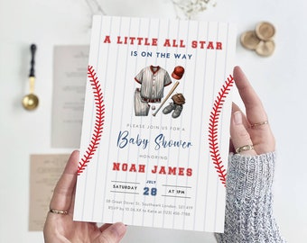 May include: A white baseball-themed baby shower invitation with red stitching around the edges. The invitation features a cartoon baseball player with a red hat, a baseball bat, and a baseball glove. The text on the invitation reads "A Little All Star Is On The Way", "Please Join Us For A Baby Shower", "Honoring Noah James", "Saturday July 28 At 1PM", "58 Great Dover St. Southwark London, SE1 4YF", and "RSVP by 10.06.XX to Katie at (123) 456-7788".