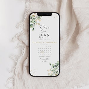 Può includere: Un biglietto digitale salva la data con un design floreale verde e oro. Il testo recita "Save the Date" per il matrimonio di Olivia e Thomas, agosto 20XX, Miami Beach, Florida. Invito formale a seguire.