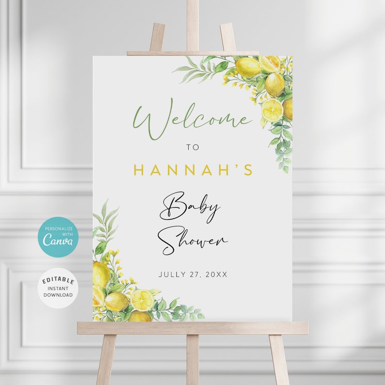 May include: A white printable sign with a lemon and greenery design. The sign says "Welcome to Hannah's Baby Shower July 27, 20XX".