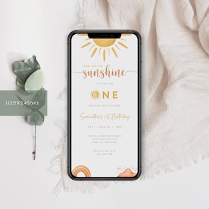 May include: A digital invitation for a first birthday party with a sun and rainbow theme. The invitation says "Our little sunshine is turning one" and includes the date, time, and location of the party. RSVP information is also included.