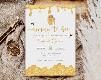 May include: A white baby shower invitation with a honey pot and bee design. The invitation reads "mommy to bee" and includes the details of the event: "Join us for a baby shower honoring Sarah Green, Saturday, August 16, 02:00 PM, The Williams Residence, 12541 Wellton Ave, Seattle, WA 12556, RSVP to Katie at 123.456.7780".