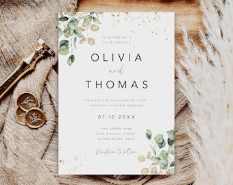 May include: A wedding invitation with the names Olivia and Thomas in a classic font, adorned with watercolor eucalyptus leaves. The invitation includes the wedding date and venue details. Gold wax seals and a pen are on the left.