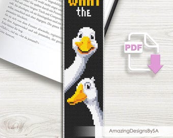May include: Black bookmark with a cross-stitch design featuring two white geese with yellow beaks and the text "WHAT the" in yellow. The bookmark is on a book.