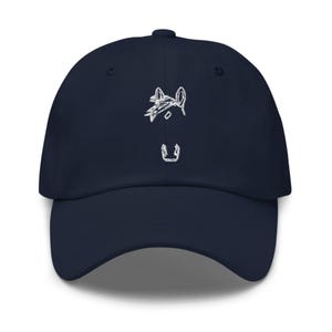 May include: A navy blue baseball cap with a white embroidered horse head design.