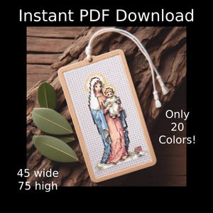 May include: A cross-stitch pattern of the Virgin Mary holding baby Jesus. The pattern is framed in a wooden frame and is 45 stitches wide and 75 stitches high. The pattern uses only 20 colours. Instant PDF download.