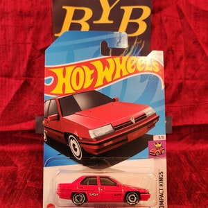 May include: A rustic wooden sign with the text "Welcome to our home" in white lettering. The sign features a distressed finish and a simple, inviting design, perfect for a front porch or entryway.