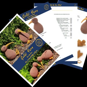 May include: A crochet pattern for a brown and yellow kiwi bird. The pattern is called "Kivi the Kiwi" and is part of the "New Zealand Wildlife Collection" by Goldi Yarn.