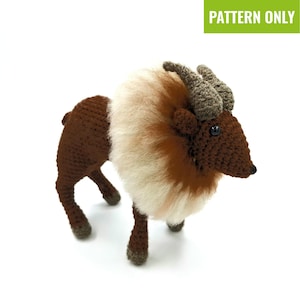May include: A crocheted goat figurine in shades of brown and white, featuring curved horns and a fluffy mane. The goat stands on four legs. The text "PATTERN ONLY" is displayed in a green rectangle in the top right corner.