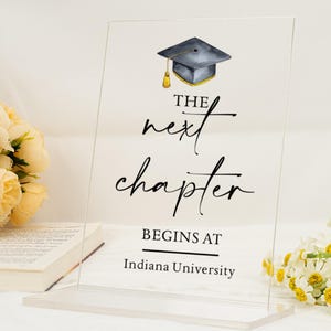 The next chapter begins at Sign, High School Senior or College Graduate Graduation Party Table Sign Decor, Graduation Next Chapter Sign