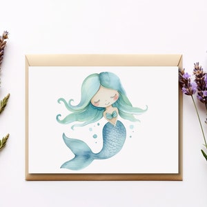 May include: A watercolor illustration of a mermaid with long blue hair and a blue tail. She has closed eyes and a sweet expression. The mermaid is surrounded by small blue bubbles.