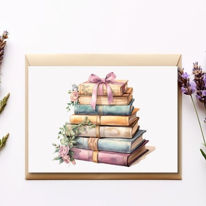 Op de afbeelding: Een stapel vintage boeken gebonden met een roze lint en versierd met bloemen. De boeken zijn in verschillende tinten blauw, geel en roze.