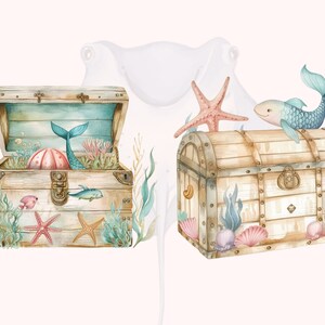 May include: Two wooden treasure chests with a nautical theme. One chest is open and contains a mermaid tail, a pink seashell, and seaweed. The other chest is closed and has a starfish, seaweed, and a blue fish on top. Both chests have gold accents.