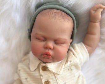 ULTIMATE flexible and realistic weighted reborn baby doll, vinyl limbs & cloth body, extra cuddly, 8 1/2 lbs. 20 inches