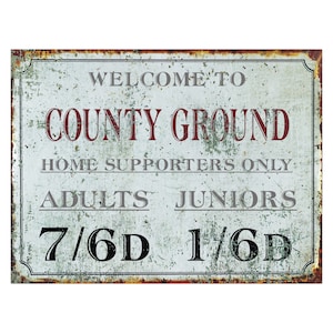 May include: A vintage-style metal sign with a rustic, weathered look. It reads "Welcome to County Ground, Home Supporters Only, Adults 7/6D, Juniors 1/6D".