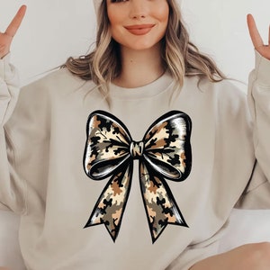 Camo Coquette Bow Sweatshirt | Cute Camo Sweater | Duck Hunting Pullover | Hunting Sweatshirt | Fall Gift for Her | Hunting Lover Sweater