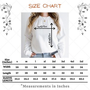 May include: A size chart for a sweatshirt, with measurements in inches. The chart shows width, length, and sleeve length for sizes S through 5XL. The text "SIZE CHART" is at the top.