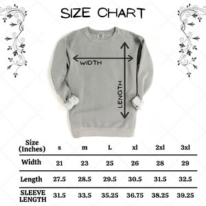 May include: Size chart for a sweatshirt in sizes small to 3XL. The chart shows measurements in inches for width, length, and sleeve length.