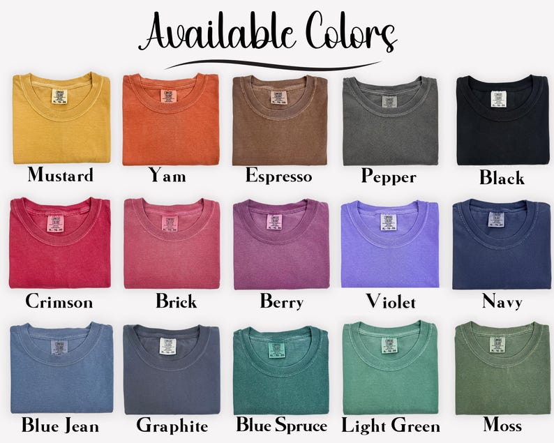 May include: A collection of fifteen crew neck t-shirts arranged in a grid, labeled Available Colors. The shirts appear in mustard, yam, espresso, pepper, black, crimson, brick, berry, violet, navy, blue jean, graphite, blue spruce, light green, and moss.