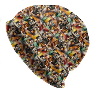 Puede incluir: Un gorro con un colorido patrón geométrico. El diseño presenta una mezcla de formas y colores, incluyendo triángulos, rectángulos y líneas curvas en tonos naranja, amarillo, verde, azul y marrón. El gorro está hecho de un material suave.