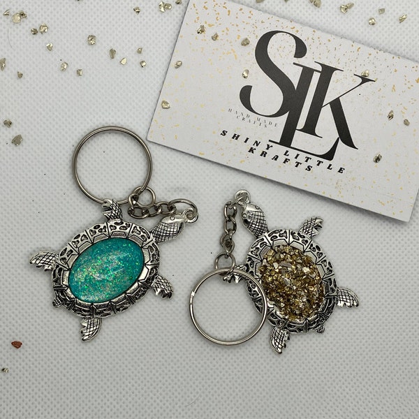 Silver turtle keychain in teal glitter smooth surface or faux druzy gold and silver style.