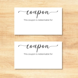 May include: Two rectangular white paper cards featuring the word coupon in a black cursive script at the top, followed by the printed text This coupon is redeemable for in a simple black sans-serif font, centered on each individual card.