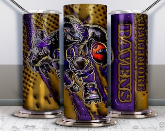 May include: A purple and gold tumbler with a cartoon raven holding a football. The tumbler has the words "Baltimore Ravens" on the side.