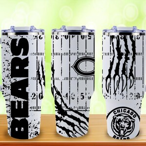 Puede incluir: Una taza de cer&aacute;mica blanca con un dise&ntilde;o floral colorido. La taza tiene un asa y un borde ancho. Las flores son en tonos de rosa, morado y amarillo. La taza es probablemente para bebidas calientes.