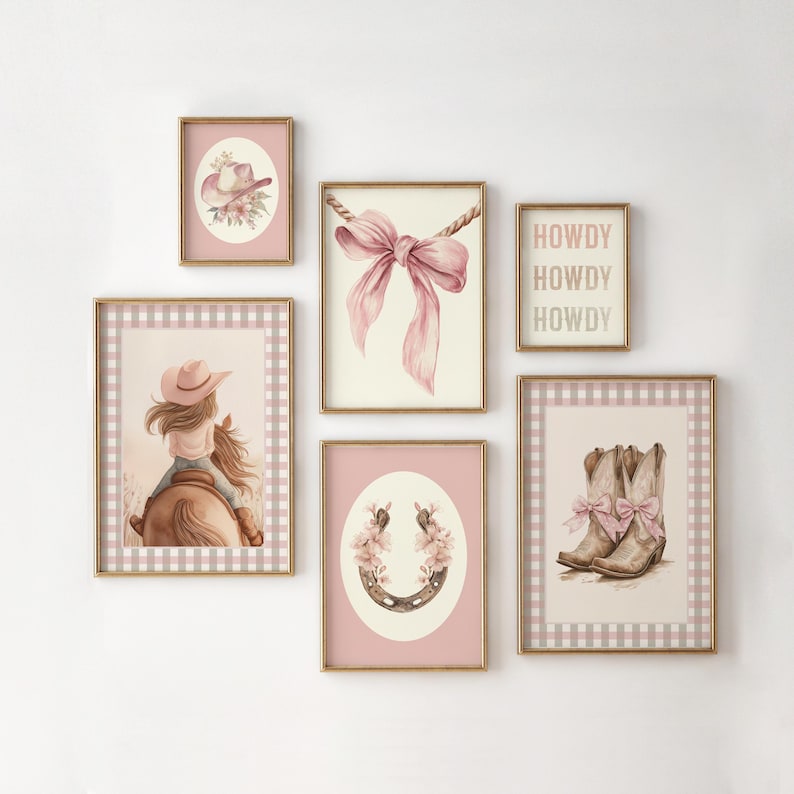 May include: A collection of framed watercolor art prints with a cowgirl theme. The prints feature a cowgirl riding a horse, a cowboy hat, a pink bow, a horseshoe, and cowboy boots. The color palette includes pink, beige, and gold.