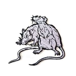 May include: Embroidered patch featuring a stylized design of two rats in shades of gray and white, outlined in black. The rats are depicted in a detailed, illustrative style, with long tails and visible whiskers. The patch is likely for clothing or accessories.