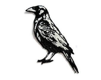 Krähe gesticktes Bügelbild.