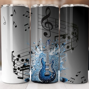 May include: Three stainless steel tumblers with a black and white musical note design. The center tumbler features a blue electric guitar with water splashing around it.