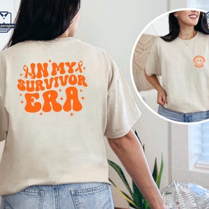 In My Survivor Era Shirt,  Leukemia Cancer Awareness Sweatshirt, Cancer Survivor Hoodie, Orange Ribbon Tee, Leukemia Support Family, Warrior