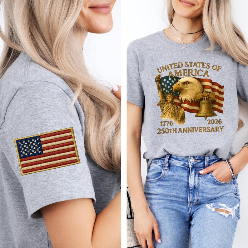 Puede incluir: Una camiseta gris con un parche bordado de la bandera estadounidense en la manga. La otra camiseta tiene un gr&aacute;fico de un &aacute;guila, una bandera y la Campana de la Libertad con el texto "UNITED STATES OF AMERICA 1776 2026 250TH ANNIVERSARY".