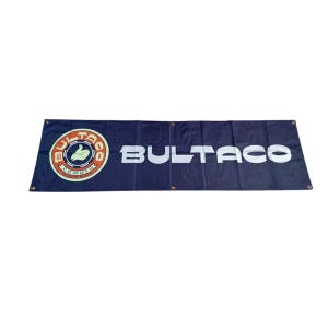 May include: A blue banner with a white circle containing a yellow hand giving a thumbs up and the text "Bultaco Motocicletas" in orange. The text "Bultaco" is in white on the right side of the banner.