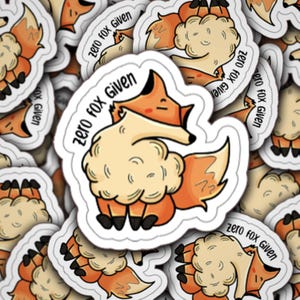 May include: A sticker featuring a cartoon fox with a fluffy tail, saying "zero fox given". The fox is orange and white, with a playful expression.