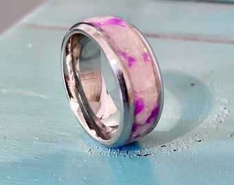 Alpine white river rock glow ring on titanium core. Free personalized inside ring laser engraving