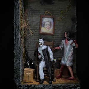 Terrifier Art and Victoria Figures on a Diorama Base