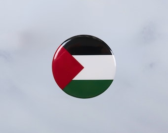 Insignia con la bandera de Palestina.