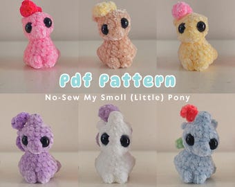May include: Six crocheted plush toys in various colors, including pink, purple, white, blue, yellow, and brown. Each toy has a small, round head with black eyes and a small, round body. The toys are arranged in two rows of three. The text "Pdf Pattern No-Sew My Smoll (Little) Pony" is displayed below the toys.