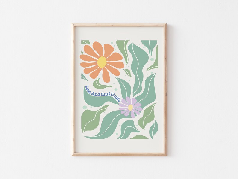May include: A printable art print with a floral design featuring orange, yellow, purple, and green flowers and leaves. The text "Love And Gratitude" is written in blue cursive.