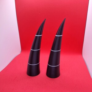 Helluva boss Millie character imp horns for cosplay or halloween, they are black and white with red background