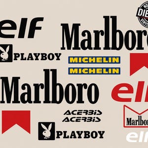 Könnte beinhalten: Eine Sammlung von gestanzten Vinyl-Aufklebern mit verschiedenen Markenlogos wie Marlboro, Elf, Playboy, Michelin und Acerbis. Die Designs sind in Schwarz, Rot, Weiß, Blau und Gelb gehalten, mit einem runden Stempel NOT PRINTED DIE CUT.