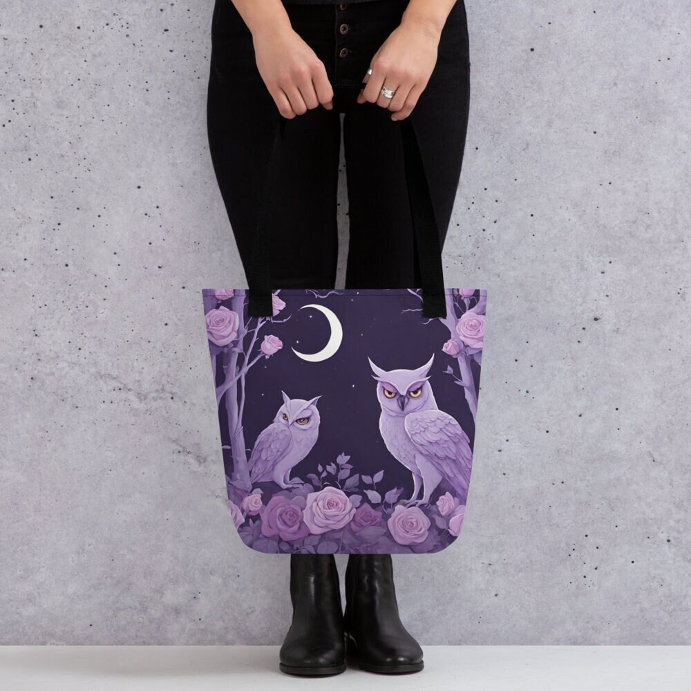 Owls under a crescent moon tote bag