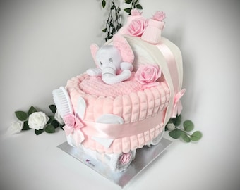 Nappy Pram with sumptuous soft pink wafer blanket & elephant comforter