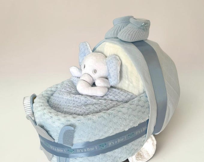 Nappy pram with elephant comforter, snuggly waffle blanket and  "its a boy" or "its a girl" detail