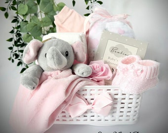 Lovely New Baby Gift Hamper Basket, baby shower, Maternity Gift. Practical baby Items for a newborn baby in pink