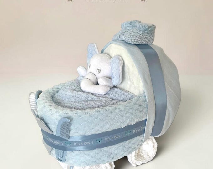 Nappy pram with elephant comforter, snuggly waffle blanket and  "its a boy" or "its a girl" detail