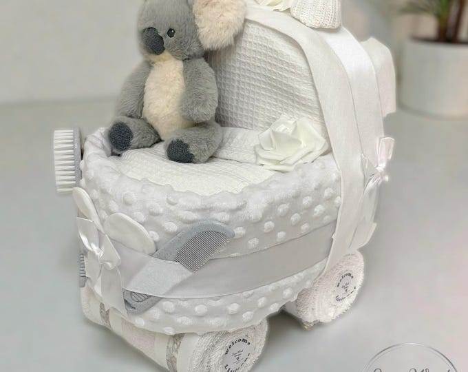 Nappy Pram with sumptuous soft pink swirl blanket with koala bear & matching rattle